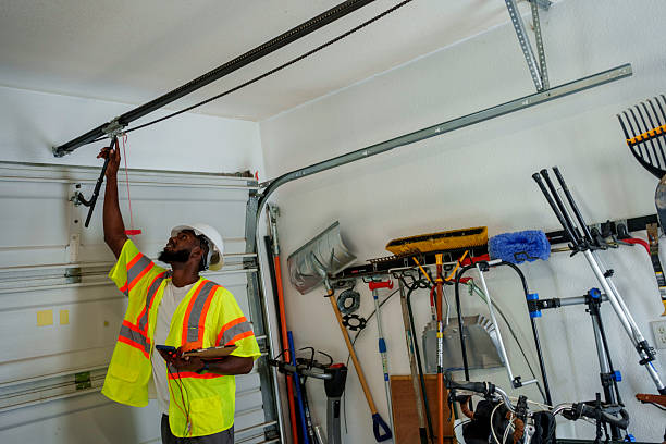 Professional Garage Door Panel Replacement technician working in Portland, MI